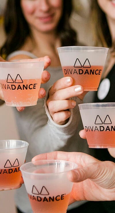 toasting with divadance logo cups