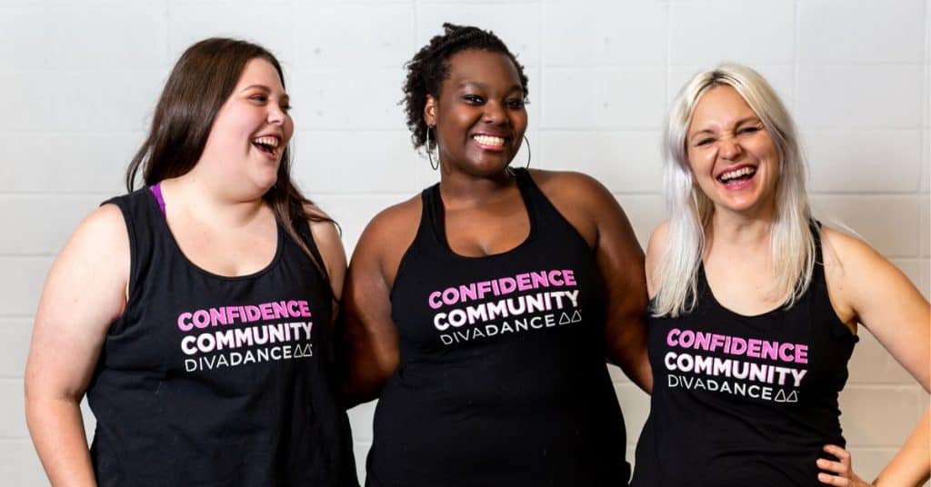 Three Diverse Women locking arms ready to buy a DivaDance franchise 