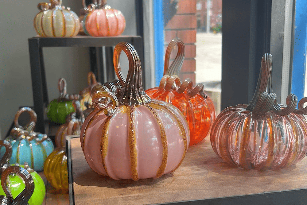 Things to do in Toledo can include admiring the mesmerizing glass pumpkins on display in a store window.